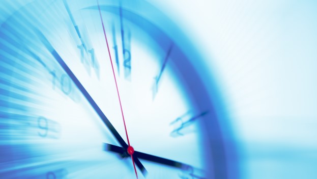 Blurry clock face in blue