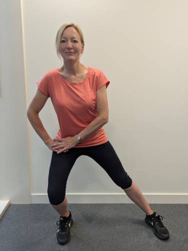 Adductor stretch (left leg shown)