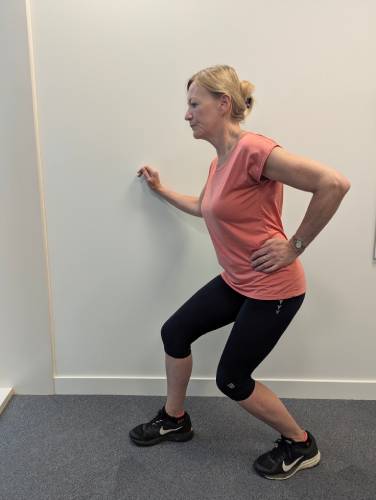 Calf stretch-soleus (left leg shown)