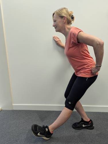 Hamstring stretch (left leg shown)