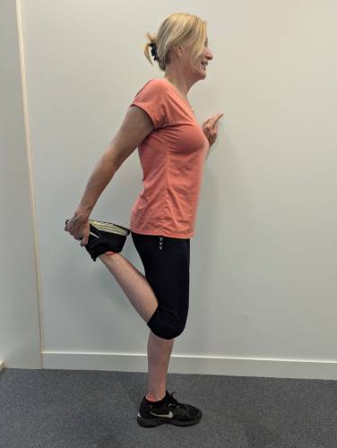 Quadriceps stretch
(right leg shown).