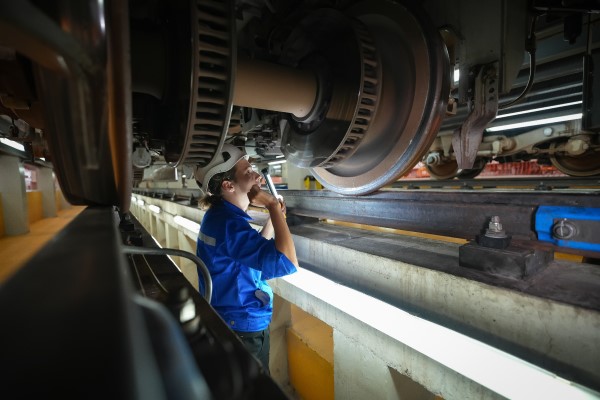 Engineer doing train maintenance