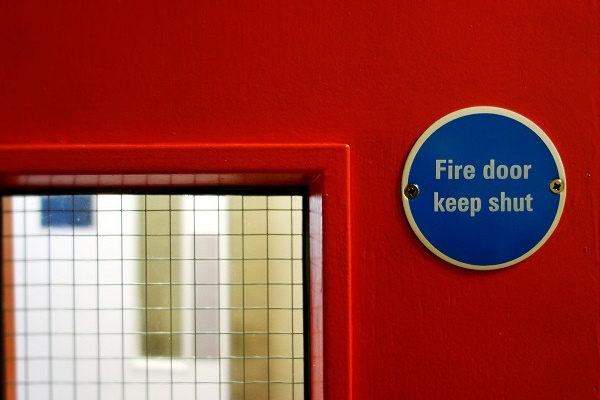 fire sign door keep shut