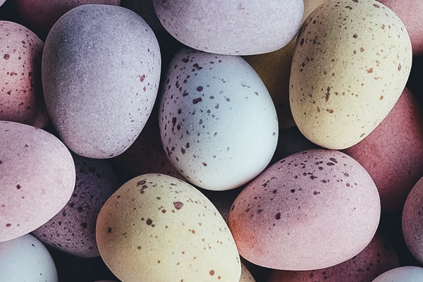 Colourful sugar-coated mini chocolate eggs representing Easter