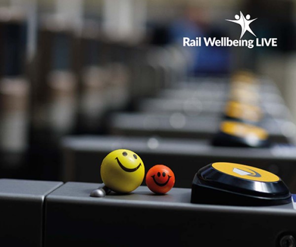 Rail Wellbeing Live 2023 smiley faces on a railway gateline ticket machines