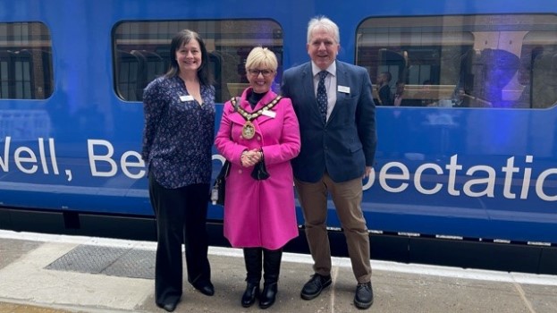 CIRAS' Susan Gray (left) pictured with Mayor of Stevenage Councillor Sandra Barr (centre) in front of a new Lumo train