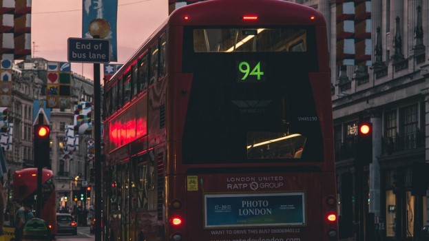 London bus driving at twilight