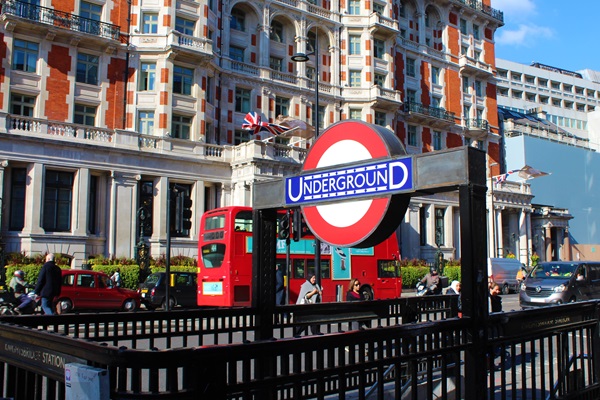 London's Knightsbridge Underground station with a red double-decker bus.