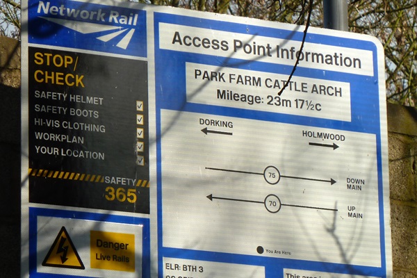 A Network Rail access board with safety information and access point details for Park Farm Cattle Arch.